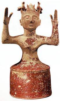 clay figurine with bell-shaped skirt painted red